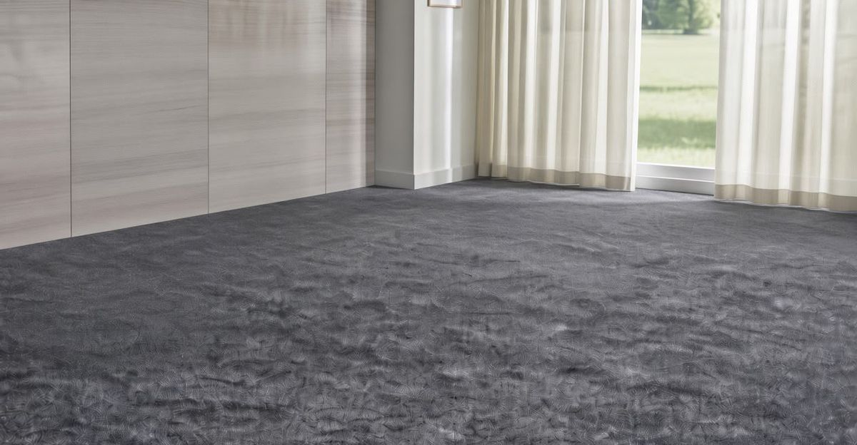Charcoal deep pile carpet fitted through a living room