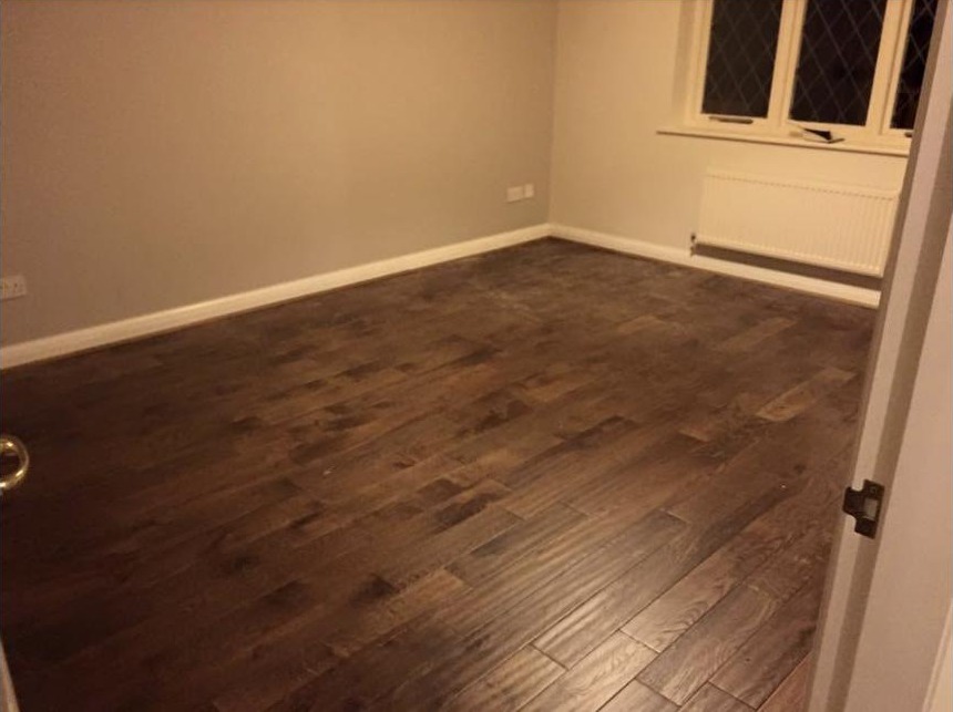 Real wood flooring in a bedroom