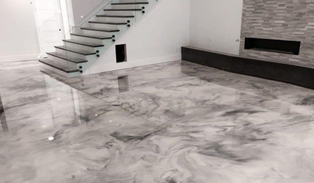 Marble effect resin floor beside an open staircase