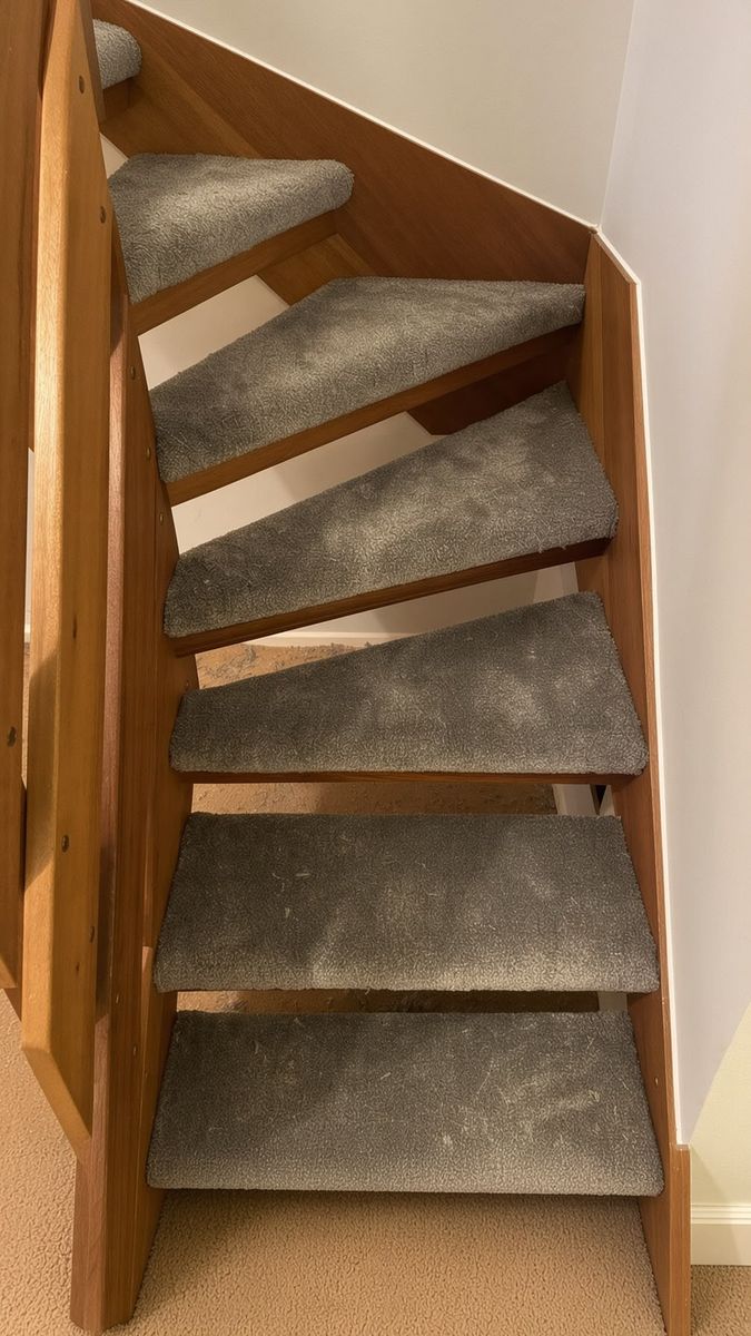 Carpet fitted to a winding staircase